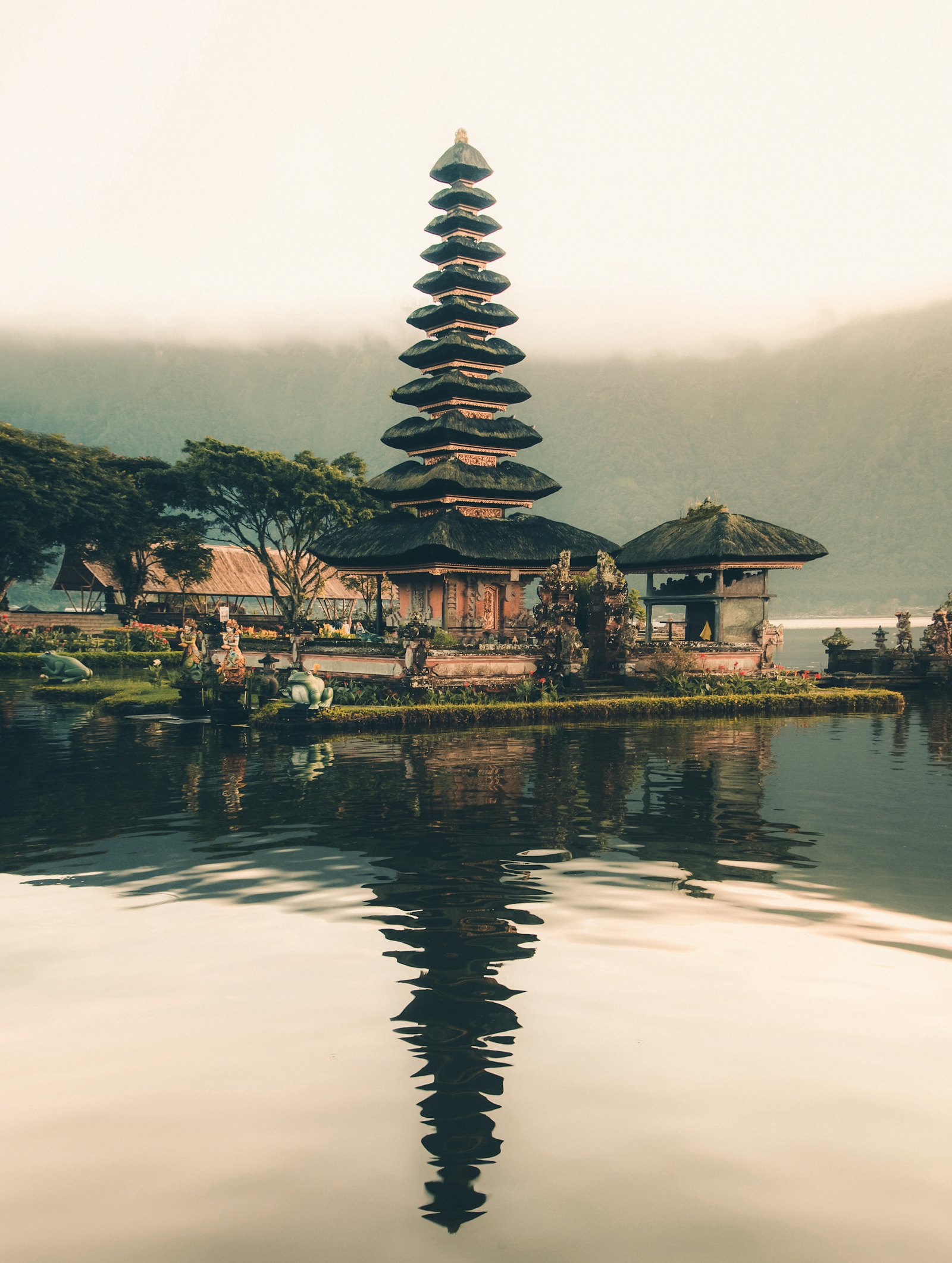 Traveller at the gates of a Bali temple